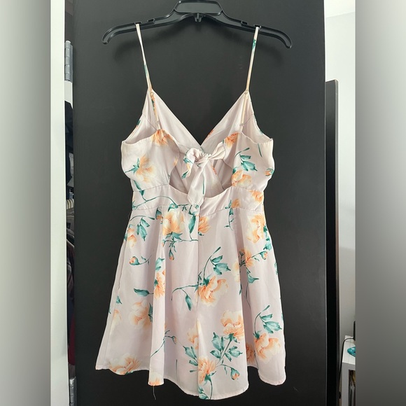 Sienna Sky Romper, Pink/Light Purple with orange/white flower decals - Picture 1 of 2